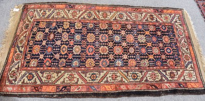 Lot 1146 - Hamadan Rug, the indigo floral latice field...