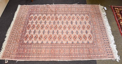 Lot 1172 - Lahore 'Bukhara' Rug, the field with three...