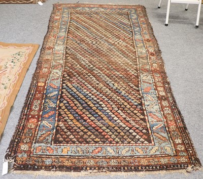 Lot 1012 - North West Persian Rug, the chocolate brown...