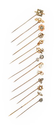 Lot 4 - Thirteen Pearl Stick Pins, of varying designs,...