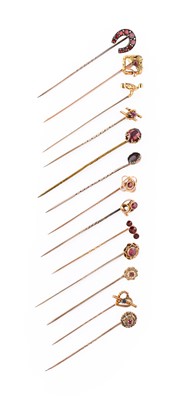 Lot 10 - Thirteen Gem-Set Stick Pins, of varying...