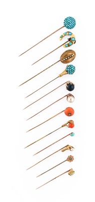 Lot 14 - Twelve Gem-Set Stick Pins, of varying designs,...