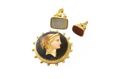 Lot 339 - A Brooch, depicting a maiden in a bead work...