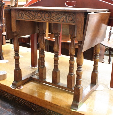 Lot 1211 - A Small Oak Drop Leaf Table, 61cm by 41cm by 60cm