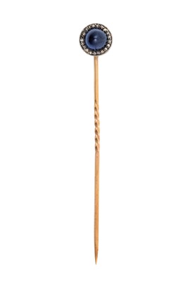 Lot 2356 - A Sapphire and Diamond Cluster Stick Pin,...