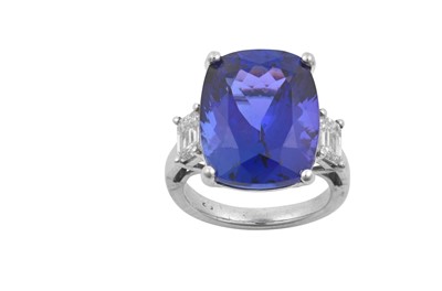 Lot 2343 - A Tanzanite and Diamond Ring the cushion cut...