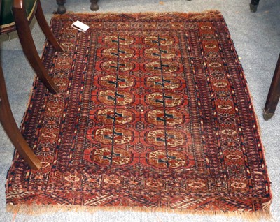 Lot 1138 - Tekke Rug, the madder field with two columns...