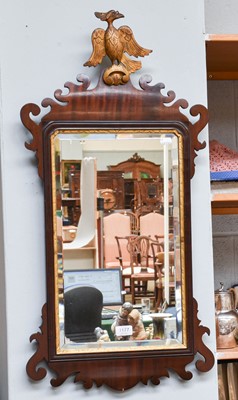 Lot 1177 - A Mahogany Fret Carved Mirror, surmounted by a...