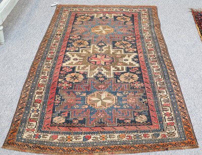 Lot 1023 - Lesghi Rug, the floral field with three...