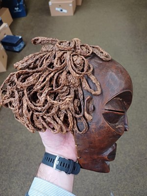 Lot 184 - A Chokwe Pwo Wood Mask, with plaited and...
