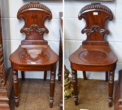 Lot 1310 - A Pair of Victorian Mahogany Hall Chairs