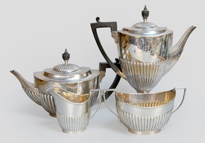 Lot 1 - A Four-Piece Victorian and Edward VII Silver...