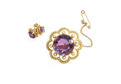 Lot 147 - An Amethyst and Split Pearl Brooch, the round...