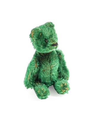 Lot 2001 - An Early 20th Century Green Plush Schuco Teddy...