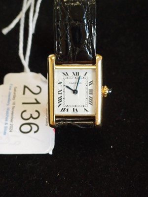 Lot 2136 - Cartier: A Lady's 18 Carat Gold Wristwatch,...