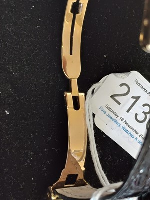 Lot 2136 - Cartier: A Lady's 18 Carat Gold Wristwatch,...