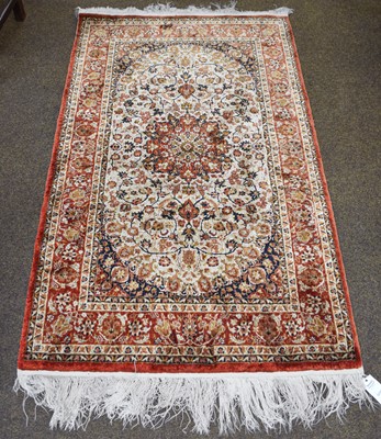 Lot 1163 - Isfahan Design Silk Rug, the cream field of...