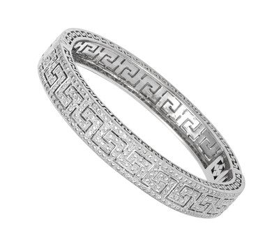 Lot 2301 - An 18 Carat White Gold Diamond Hinged Bangle...