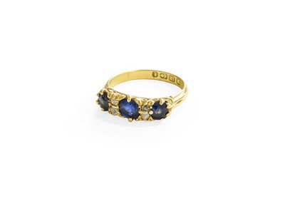 Lot 151 - An 18 Carat Gold Sapphire and Diamond Ring,...