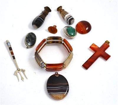 Lot 39 - Two banded agate desk seals, an agate crucifix, an agate bracelet, a moss agate brooch, a malachite