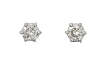 Lot 2247 - A Pair of Diamond Solitaire Earrings the round...