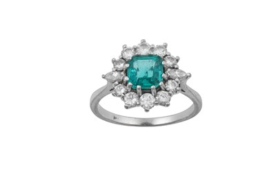 Lot 2259 - An Emerald and Diamond Cluster Ring the...