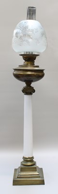 Lot 233 - A Victorian Oil Lamp, with brass and opaque...