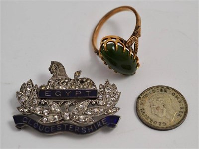 Lot 49 - Gloucestershire 'Egypt' badge and a ring