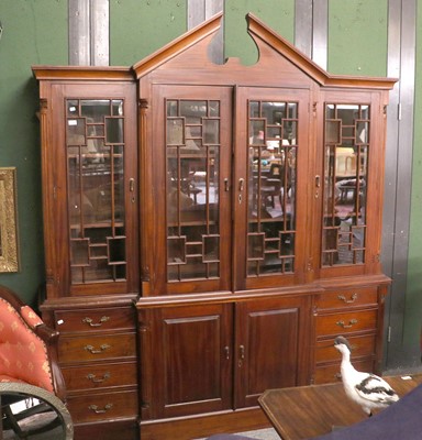 Lot 1368 - A Mahogany Breakfront Bookcase, the...