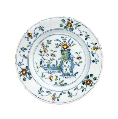 Lot 37 - An English Polychrome Delft Plate, circa 1730,...