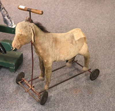 Lot 1135A - A Steiff Donkey on Wheels, circa 1930, straw...