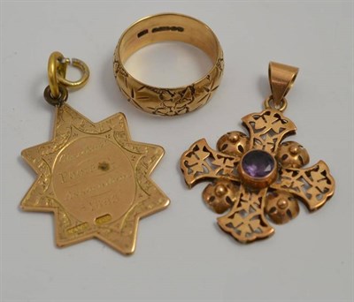 Lot 62 - A 9ct gold patterned band ring, a shield stamped '9CT' and a Maltese cross pendant, stamped...