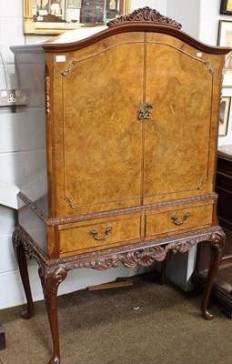 Lot 1200 - A Carved and Burr Walnut Cocktail Cabinet,...