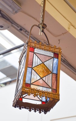 Lot 1369 - A Brass Leaded and Coloured Glass Lantern,...