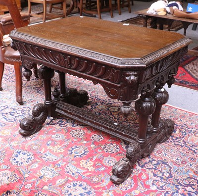 Lot 1416 - A Victorian Carved Oak Library Table, on...