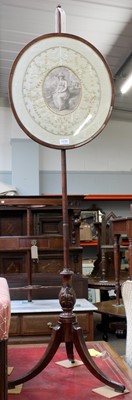 Lot 1235 - A 19th Century Mahogany Polescreen, with...