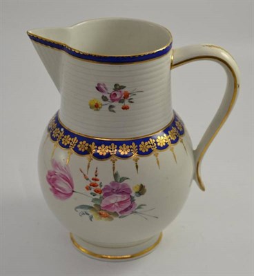 Lot 85 - A 19th century Derby porcelain ale jug decorated with flowers and highlighted in gilt