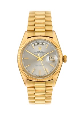 Lot 2187 - Rolex: An 18 Carat Gold Automatic Day/Date...