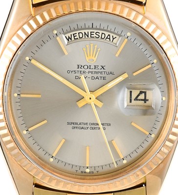 Lot 2187 - Rolex: An 18 Carat Gold Automatic Day/Date...