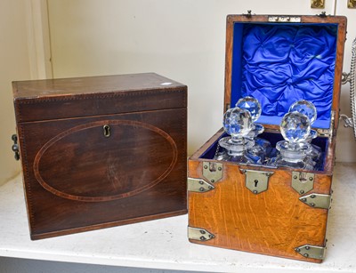 Lot 173 - An Oak Four Bottle Decanter Box, with silver...