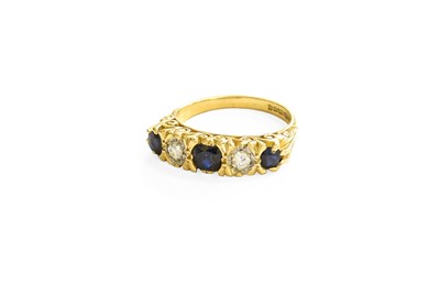 Lot 155 - An 18 Carat Gold Sapphire and Diamond Five...