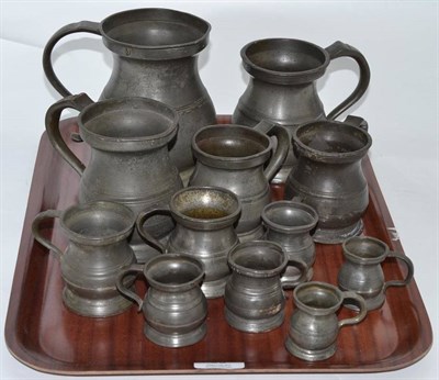Lot 95 - A collection of twelve pewter measures