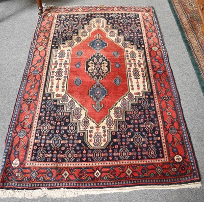 Lot 1151 - Hamadan Rug, the faded blood red lozenge field...