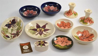 Lot 113 - Ten pieces of Moorcroft pottery including coral hibiscus, anemone etc