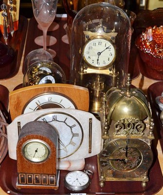 Lot 115 - A tray including three anniversary clocks, a lantern style clock, two silver pocket watches etc