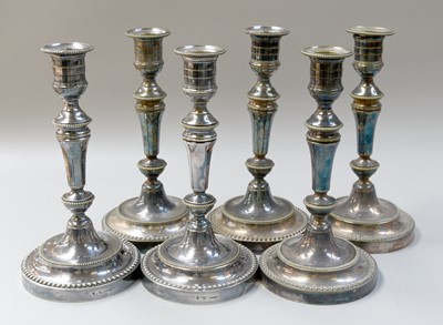 Lot 134 - A Set of Six French Silver Plate Candlestick,...