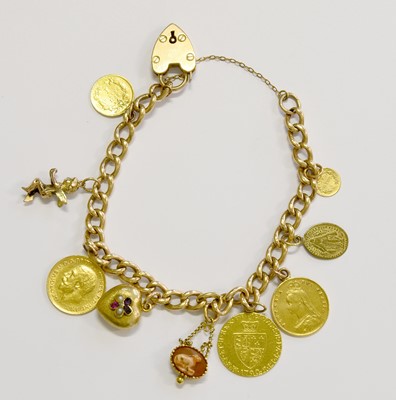 Lot 193 - A Charm Bracelet, hung with various charms and...