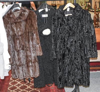 Lot 1243 - Black Astracan Long Fur Coat with rose details...