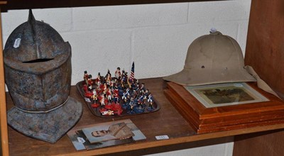 Lot 131 - Reproduction helmet, pith hat, pictures and chess set