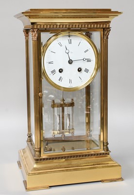 Lot 410 - A French Brass L'Epee Four Glass Mantel Clock,...